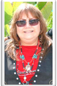woman in sunglasses with native jewelry